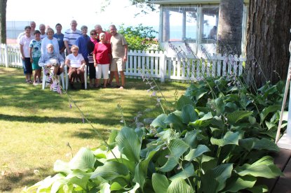 Group picture in front of lake